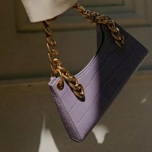 Purple purse with chain
